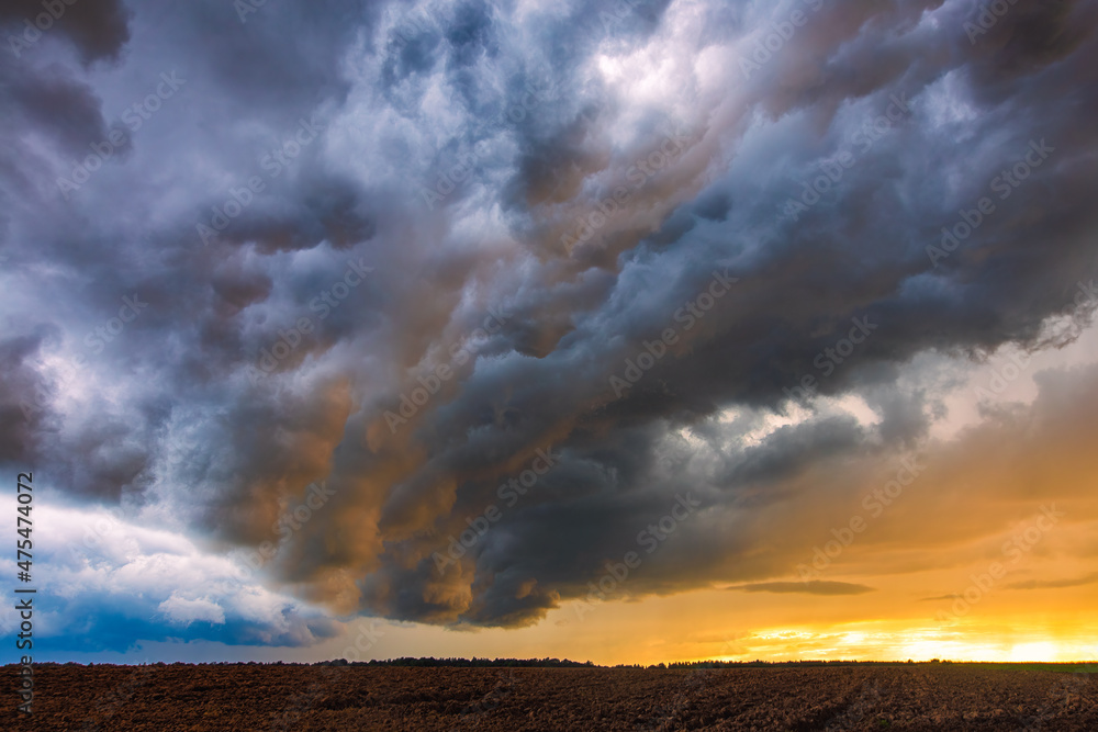 Thunder storm with shelf cloud at sunset, summer, Lithuania