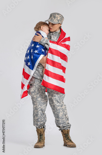 Female soldier and her litt...