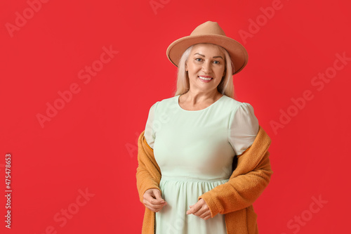 Fashionable mature woman in...