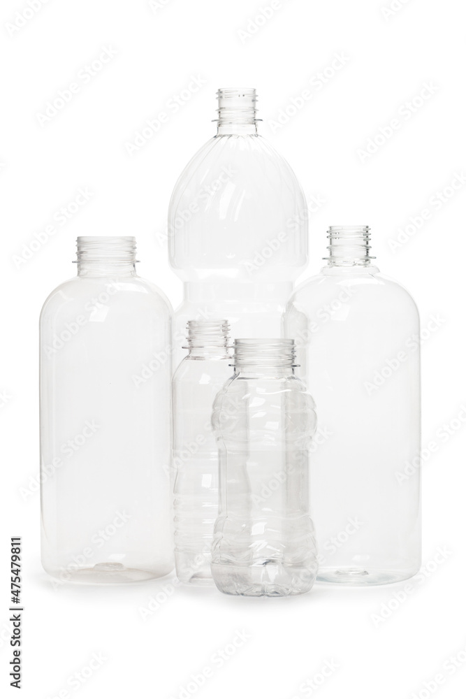many different empty plastic bottles isolated on white background. many different empty plastic bottles isolated on white background.