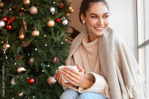 Beautiful young woman with ...