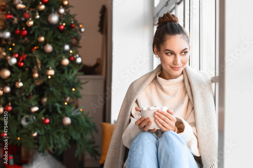 Beautiful young woman with ...