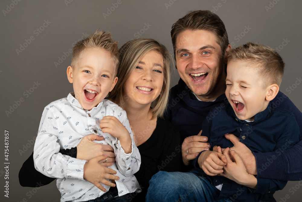 Happy family studio portrait