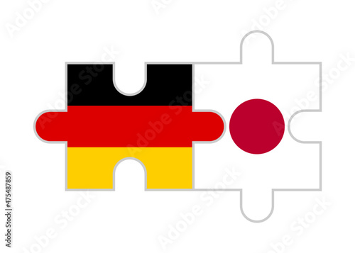 Canvas Print puzzle pieces of germany and japan flags