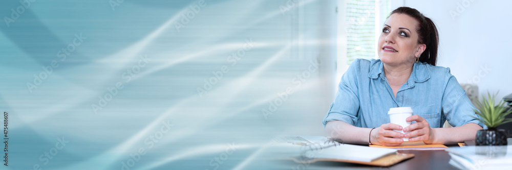 Young businesswoman having coffee break; panoramic banner Young businesswoman having coffee break; panoramic banner