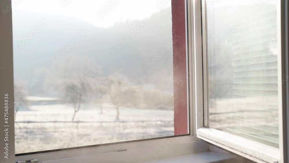 Fresh winter morning smoke through window on a sunny day 4K Fresh winter morning smoke through window on a sunny day 4K