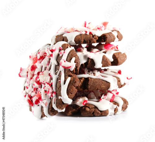 Tasty candy cane cookies on white background