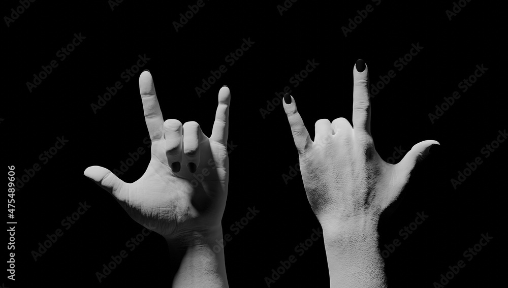 Rock gesture in black background. 3d rendering. Rock gesture in black background. 3d rendering.
