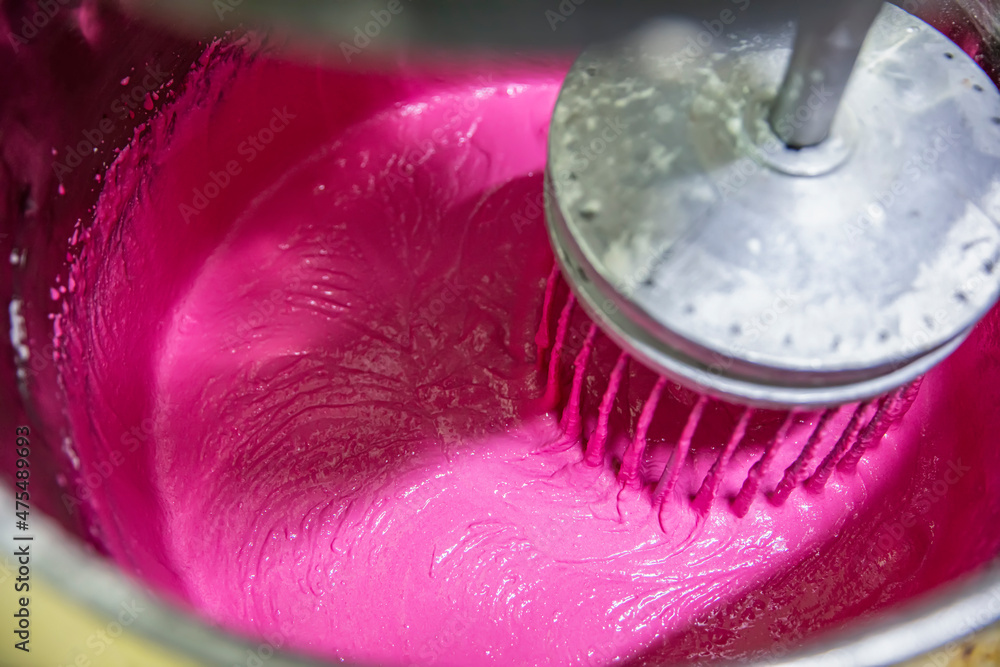 Production of macarons. Preparation of pink dough. Pink Buttercream