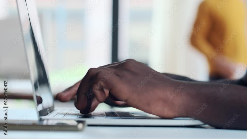 Video of close up of hands of business man working while typing on laptop in a coworking place. Video of close up of hands of business man working while typing on laptop in a coworking place.
