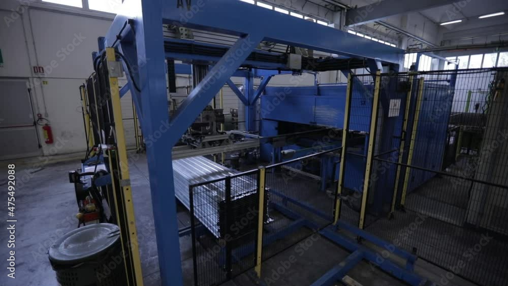 Factory machine working on metal components.
Automated production. Factory machine working on metal components.
Automated production.