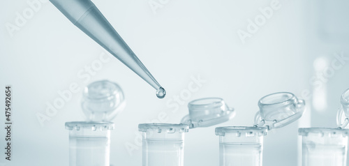 Pipette and test tubes in a microbiological laboratory photo