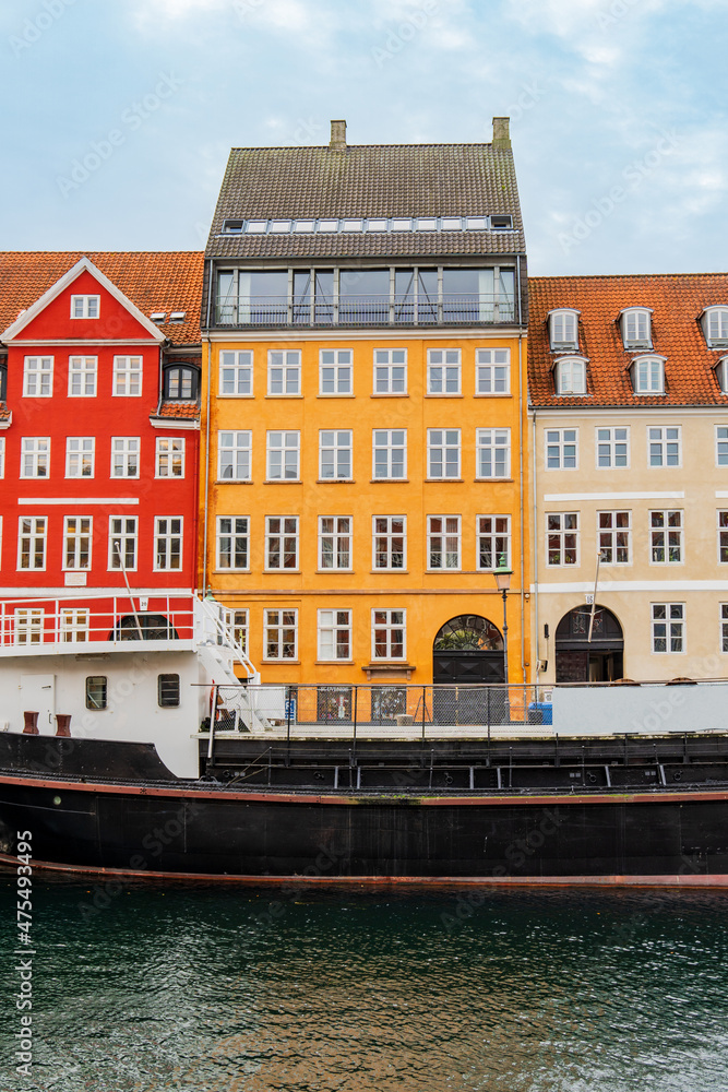Naklejka premium Copenhagen, Denmark - October 1, 2021: Detail of the facade of a house in Nyhavn, in the historical center of Copenhagen