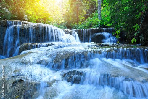 Fototapeta Naklejka Na Ścianę i Meble -  Kao fu waterfall Beautiful waterfall in jungle forest ,Tham pha tai NationalPark,Lampang,Thailand .