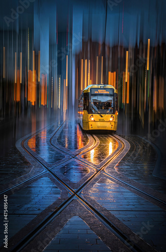 Manchester Tram at Stop in Rain with ICM photo