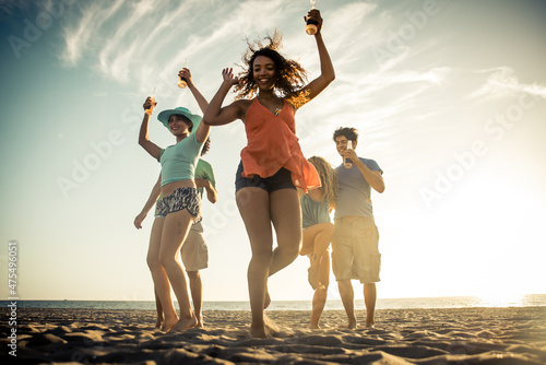 Photography Group of friends having fun on the beach in Los angeles