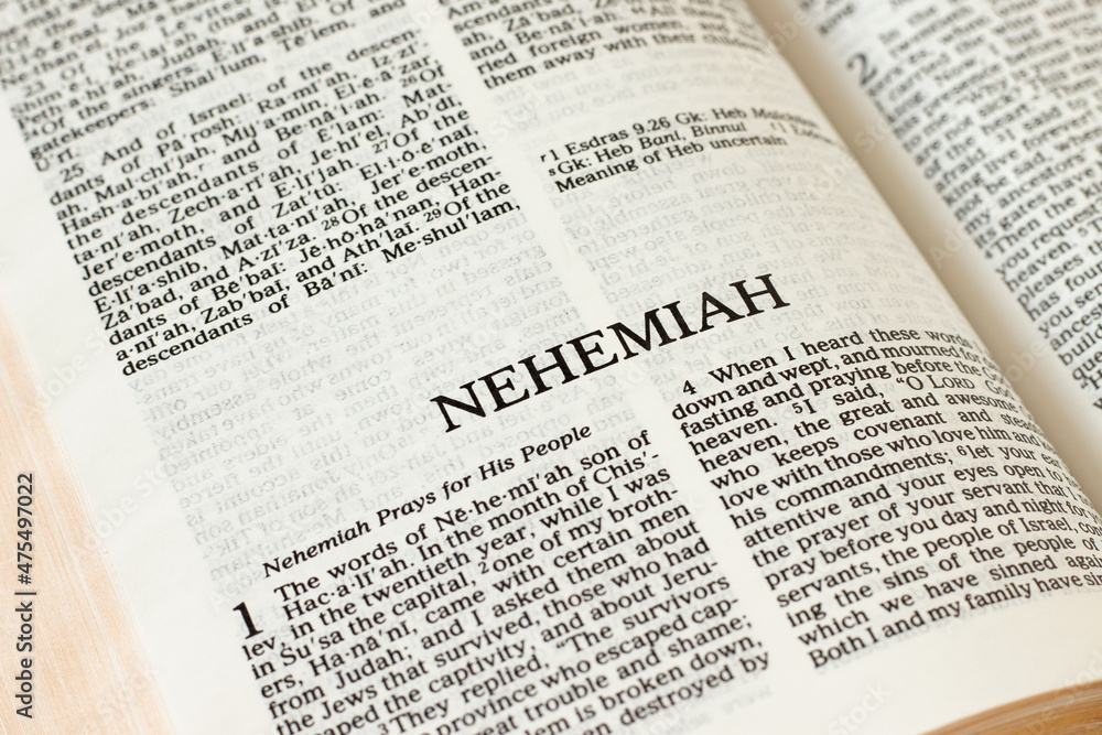 Nehemiah Bible open Book Holy Christian Scripture Old Testament. Biblical concept. Pages of the Word of God and Jesus Christ written in English. A close-up. Nehemiah Bible open Book Holy Christian Scripture Old Testament. Biblical concept. Pages of the Word of God and Jesus Christ written in English. A close-up.