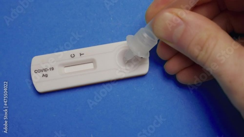 Corona Fast self Test - Covid-19 Antigen Test negative (4K)
Applying a Corona Rapid Test - Covid-19 Antigen Test - Sars COV 2 indicator. Showing Nositive result, not infected sample. 