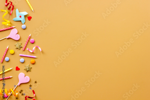 Confetti with party hats and balloons for kids birthday