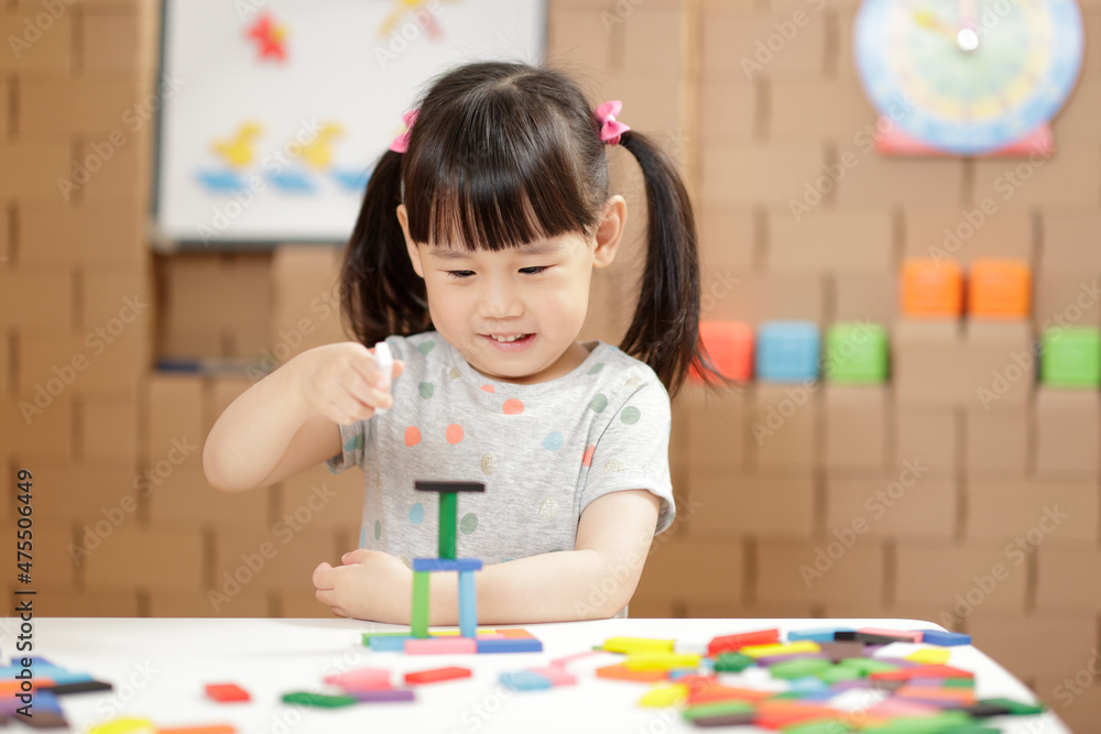 young girl play number sticks fine motor skill game for homeschooling young girl play number sticks fine motor skill game for homeschooling