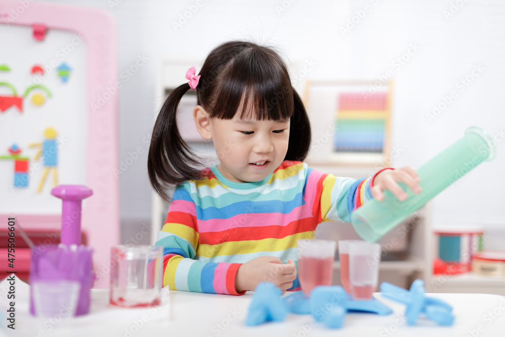 young girl pretend playing food preparing at home young girl pretend playing food preparing at home