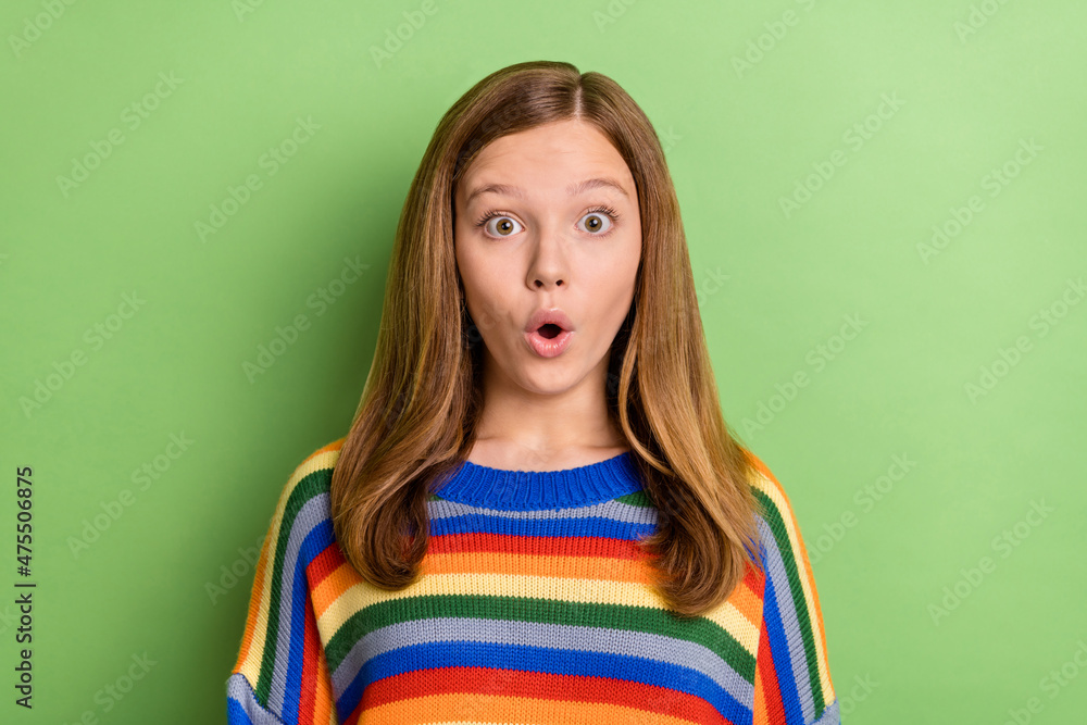 Fototapeta premium Portrait of attractive sweet funny girly girl sudden news reaction pout lips isolated over bright green color background