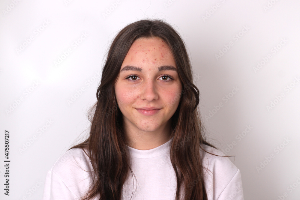Portrait of authentic cute teenage girl without makeup on light background. - obrazy, fototapety, plakaty 