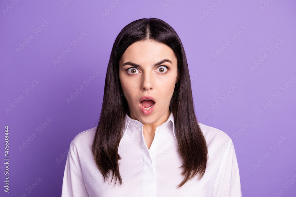 Photo of young woman astonished crazy bad fake novelty unexpected isolated over violet color background Photo of young woman astonished crazy bad fake novelty unexpected isolated over violet color background