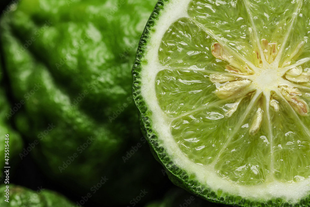 Whole and cut ripe bergamot fruits, closeup Whole and cut ripe bergamot fruits, closeup