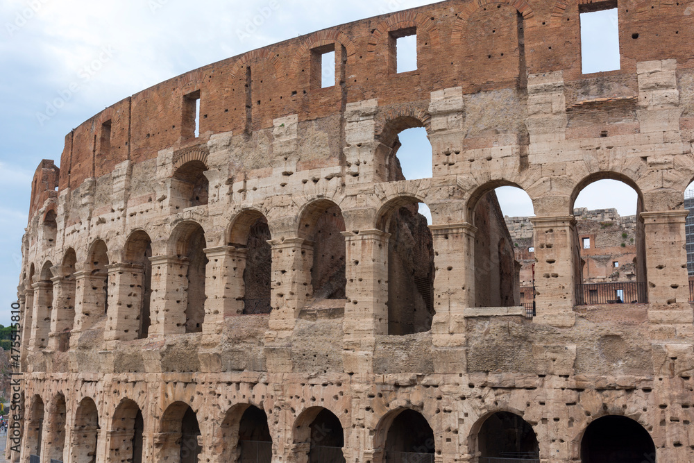 views and details of the colosseum monument in rome in Italy