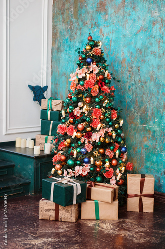 New Year's interior, holiday, Christmas, cozy and warm. Christmas tree and fireplace 