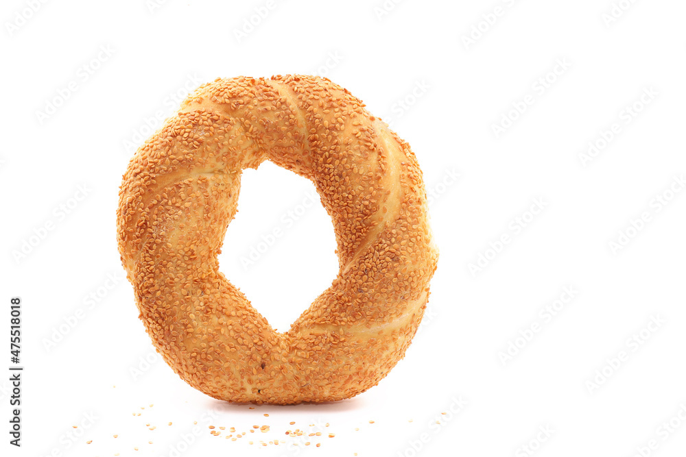 Simit or gevrek, traditional Turkish pastry food on the white wooden background Simit or gevrek, traditional Turkish pastry food on the white wooden background