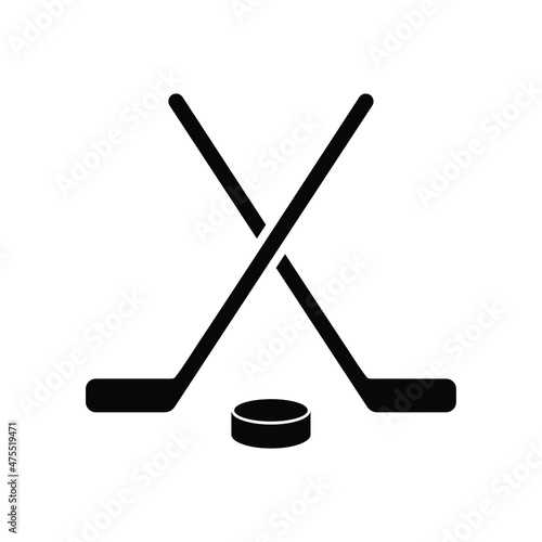 hockey stick and puck
