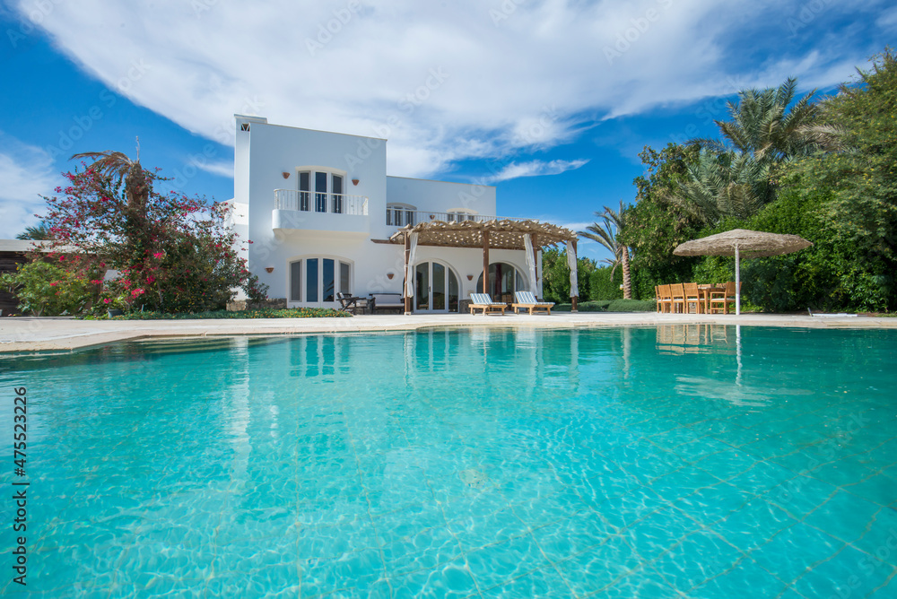 Swimming pool at at luxury tropical holiday villa