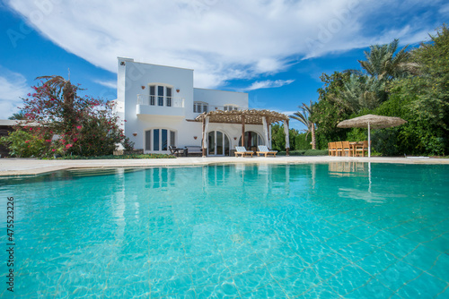 Swimming pool at at luxury tropical holiday villa