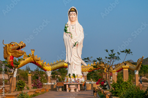 Statue of a lady Buddha, bodhisattva Guanyin, south of Hua Hin on the road between Pranburi and Sam Roi Yot in Prachuap Khiri Khan Province of Thailand.