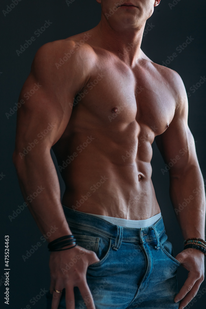 young man, brutal appearance, with a beautiful torso, bodybuilder, in the studio young man, brutal appearance, with a beautiful torso, bodybuilder, in the studio