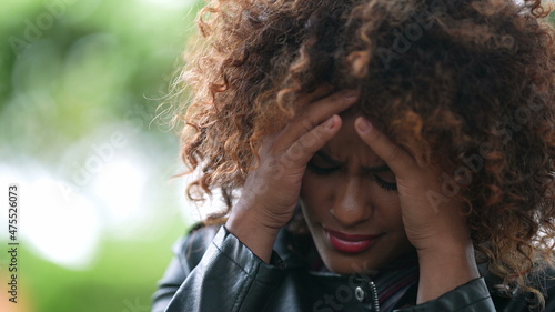 Worried black African woman suffering from emotional problems