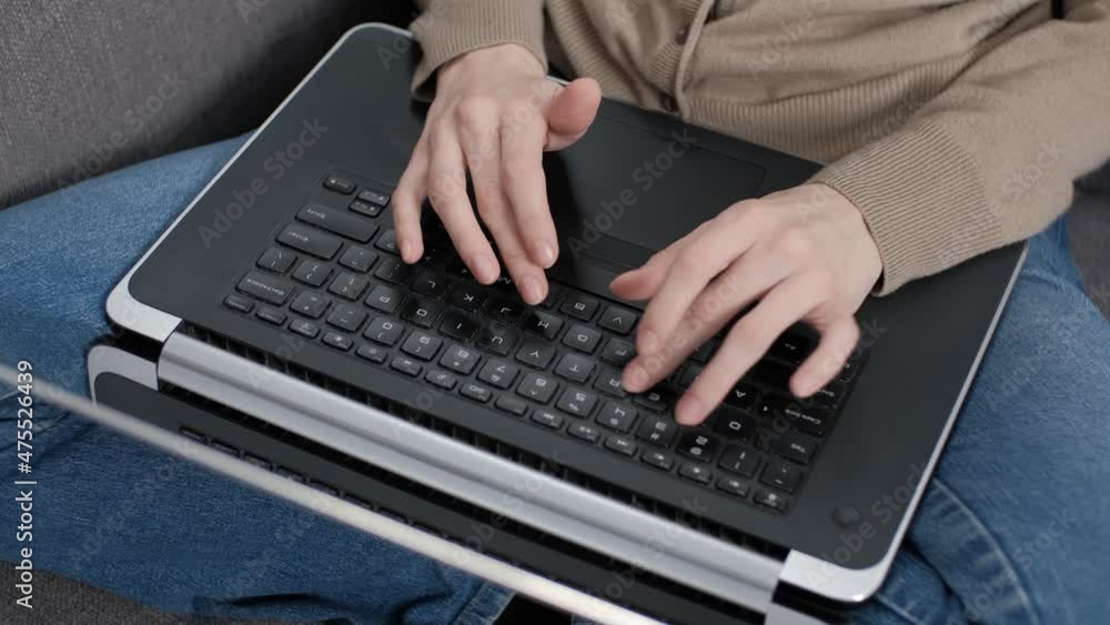 Freelancer woman working from home, typing text on laptop computer Freelancer woman working from home, typing text on laptop computer