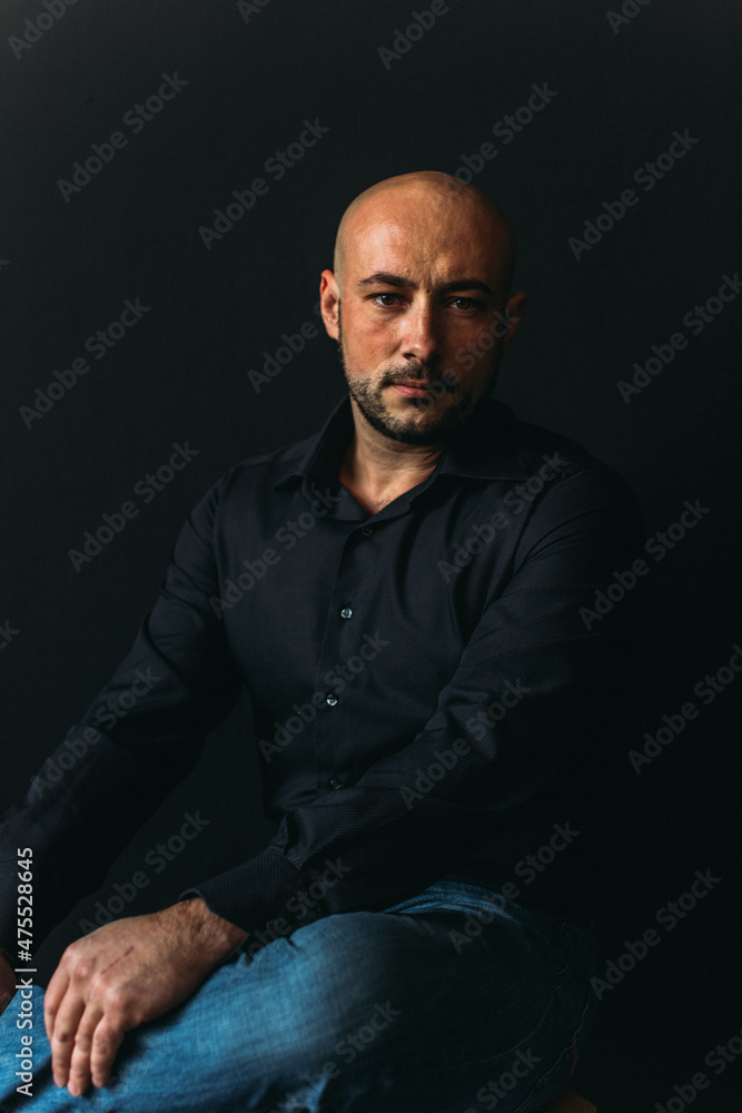 young man, business, speaker, businessman, studio portrait on black background.