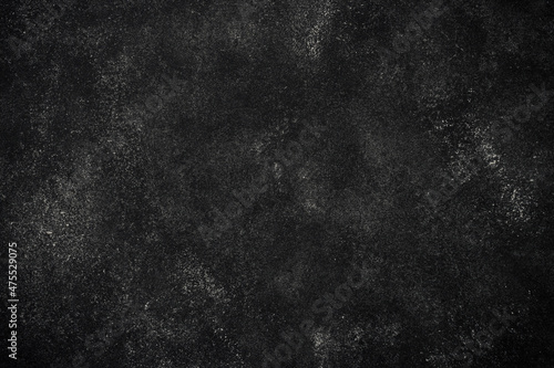 Black stone background. Empty space for design.