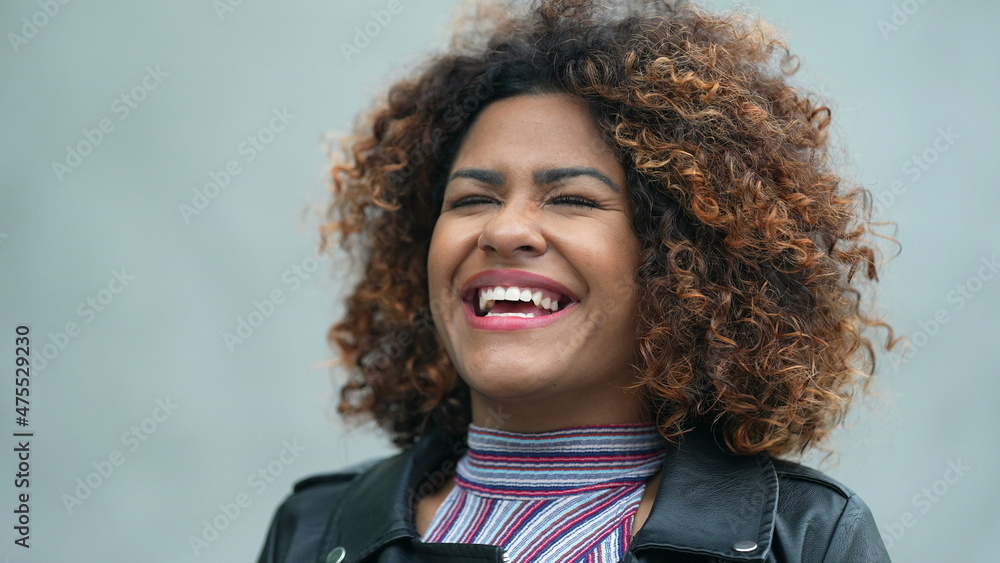 Carefree black woman portrait smiling feeling free Carefree black woman portrait smiling feeling free