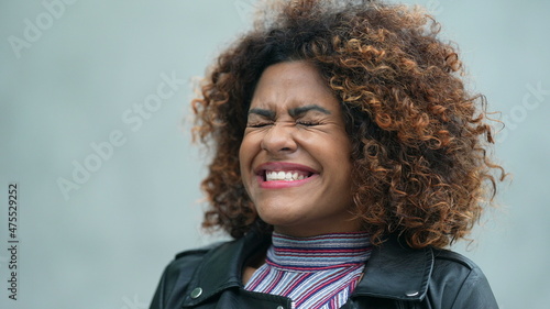 Carefree black woman portrait smiling feeling free