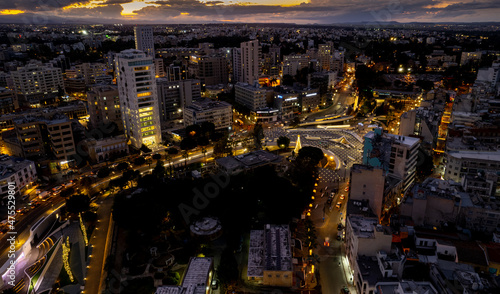 Aerial drone photograph of cityscape of Nicosia in Cyprus at sunset