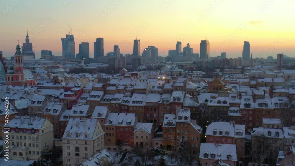 Warsaw Old Town and distant city center at dusk in winter, aerial 4K footage Warsaw Old Town and distant city center at dusk in winter, aerial 4K footage