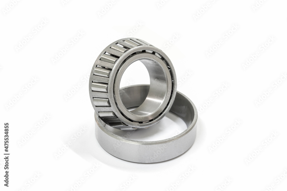 Modify taper bearing on a white background, Motorcycle taper bearing close-up, Motorcycle modify. Modify taper bearing on a white background, Motorcycle taper bearing close-up, Motorcycle modify.