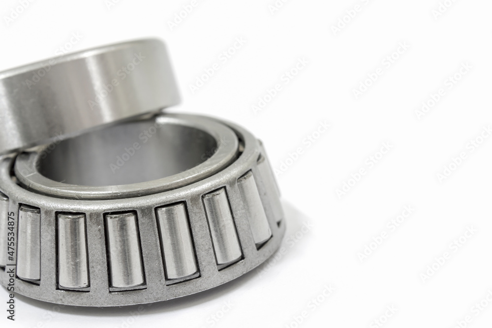 Modify taper bearing on a white background, Motorcycle taper bearing close-up, Motorcycle modify. Modify taper bearing on a white background, Motorcycle taper bearing close-up, Motorcycle modify.