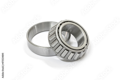 Modify taper bearing on a white background, Motorcycle taper bearing close-up, Motorcycle modify. photo