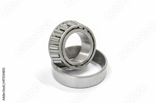 Modify taper bearing on a white background, Motorcycle taper bearing close-up, Motorcycle modify. photo