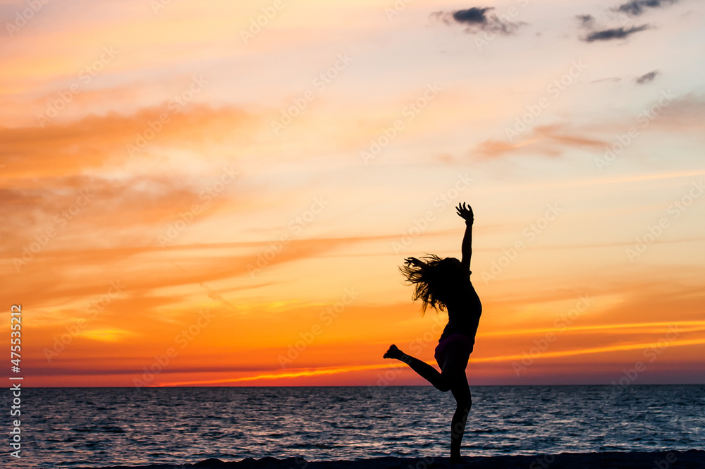 A Young Girl Child Kid Teenager Woman Lady Dancing in the Sunlight Sunset Blue Orange Silhouette Shadow Black Sky Colorful Get Outside Fresh Air Childhood Unplugged Play Run Wind Fun 